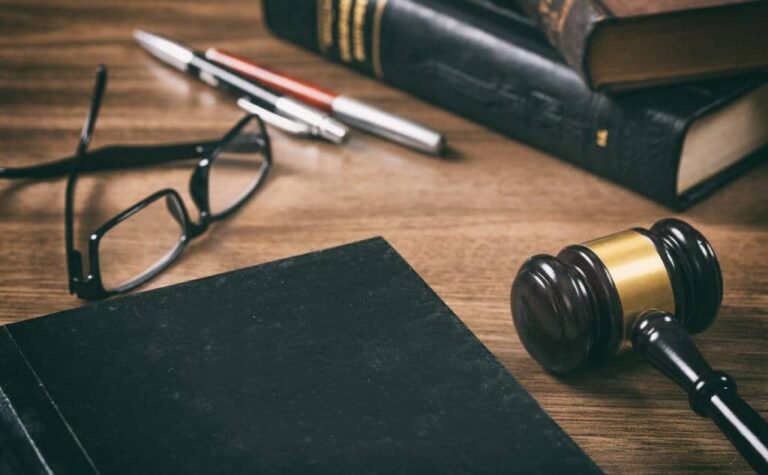 law or auction gavel and a book wooden office PQZMXWE 1024x633 1 768x475